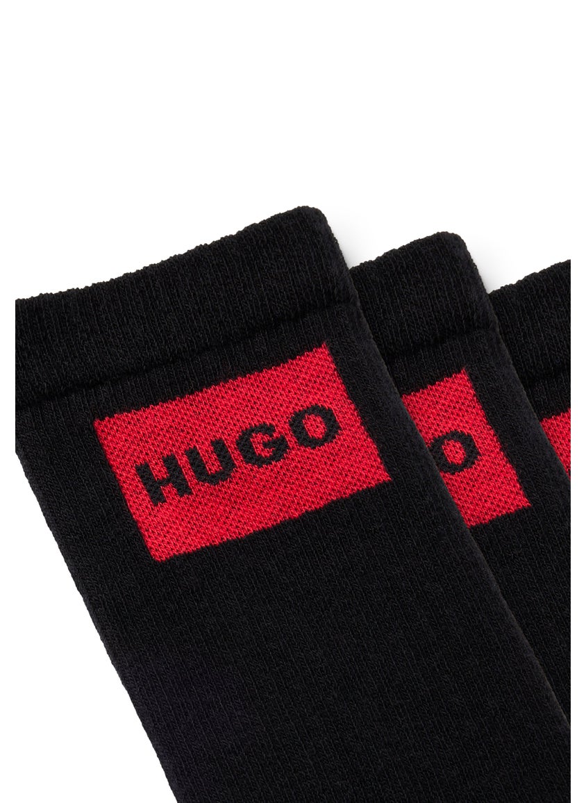 Three-pack of short socks with red logo labels