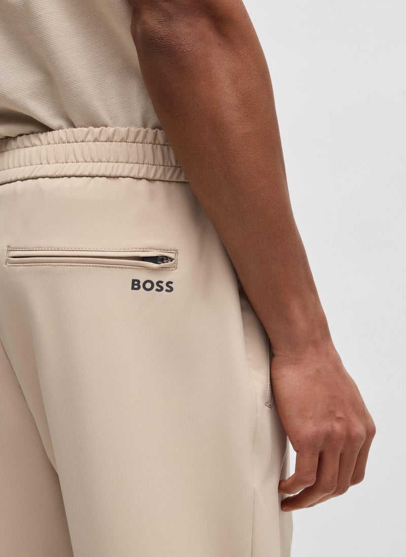 Tapered-fit trousers in water-repellent stretch fabric