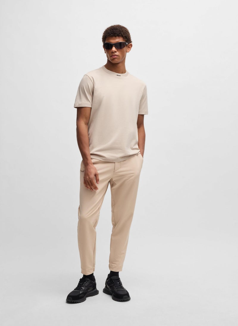 Tapered-fit trousers in water-repellent stretch fabric