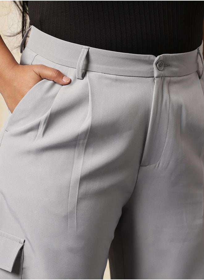 Women Trousers in Grey featuring Wide Leg fit with a solid pattern, regular length, secured with button closure, crafted from 95% polyester 5% spandex – a stylish must-have for any occasion.