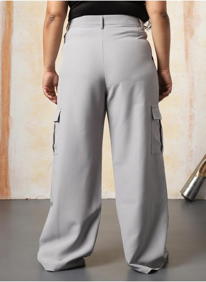 Women Trousers in Grey featuring Wide Leg fit with a solid pattern, regular length, secured with button closure, crafted from 95% polyester 5% spandex – a stylish must-have for any occasion.