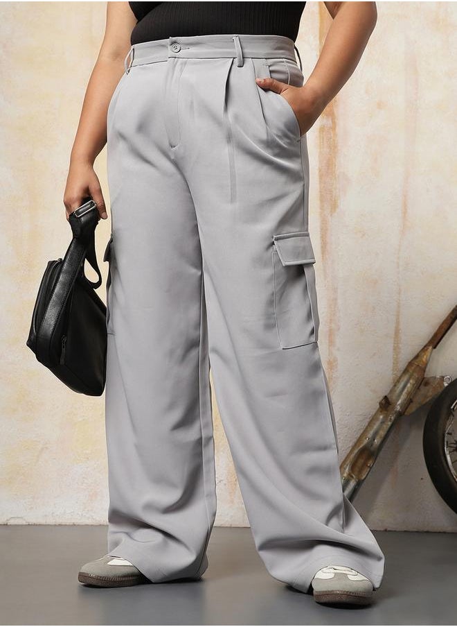 Women Trousers in Grey featuring Wide Leg fit with a solid pattern, regular length, secured with button closure, crafted from 95% polyester 5% spandex – a stylish must-have for any occasion.