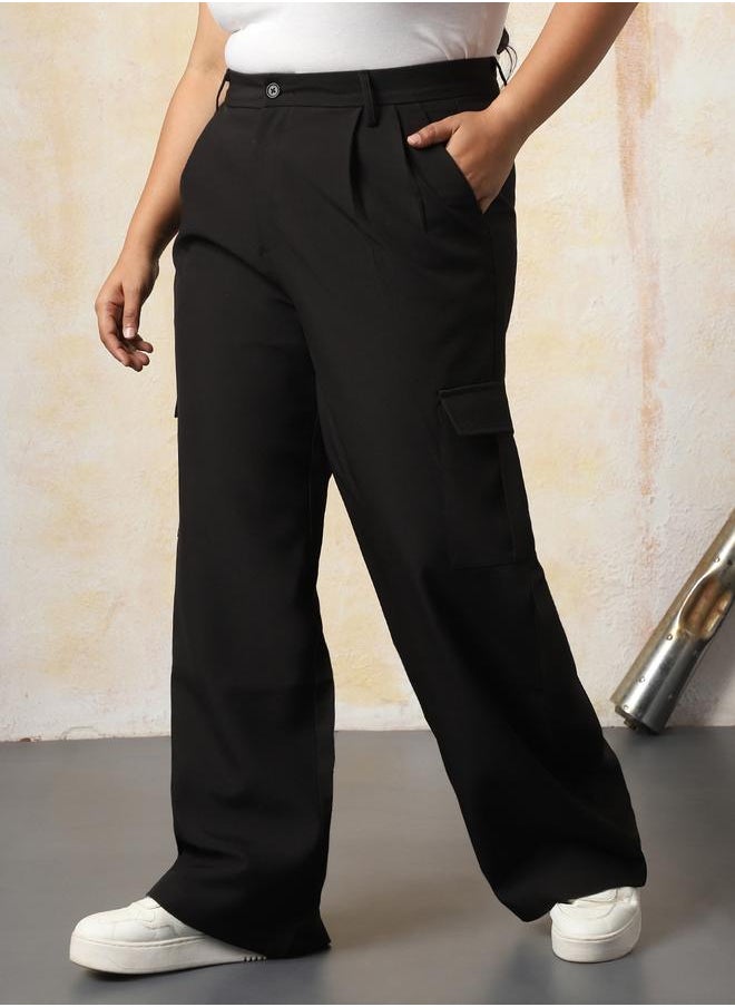 Women Trousers in Black featuring Wide Leg fit with a solid pattern, regular length, secured with button closure, crafted from 95% polyester 5% spandex – your go-to choice for effortless elegance.