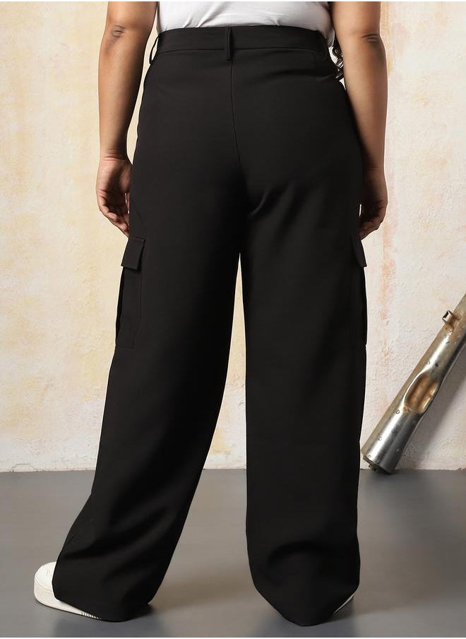 Women Trousers in Black featuring Wide Leg fit with a solid pattern, regular length, secured with button closure, crafted from 95% polyester 5% spandex – your go-to choice for effortless elegance.