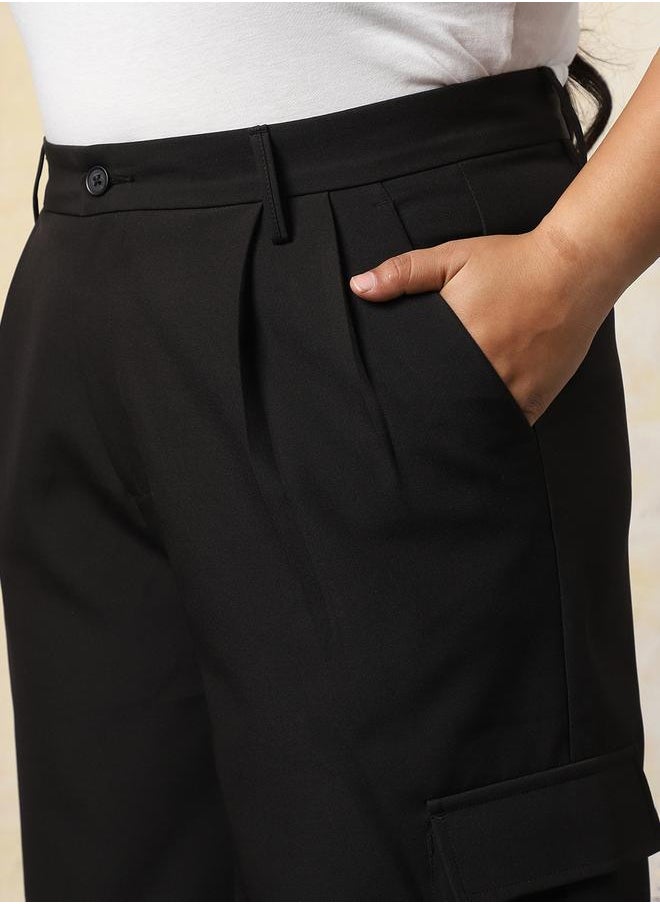Women Trousers in Black featuring Wide Leg fit with a solid pattern, regular length, secured with button closure, crafted from 95% polyester 5% spandex – your go-to choice for effortless elegance.