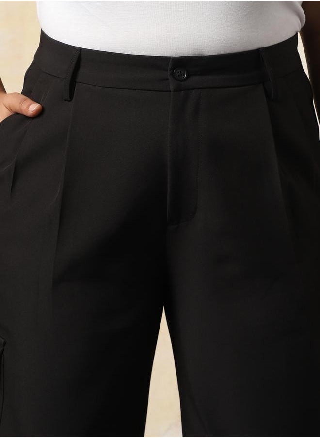 Women Trousers in Black featuring Wide Leg fit with a solid pattern, regular length, secured with button closure, crafted from 95% polyester 5% spandex – your go-to choice for effortless elegance.