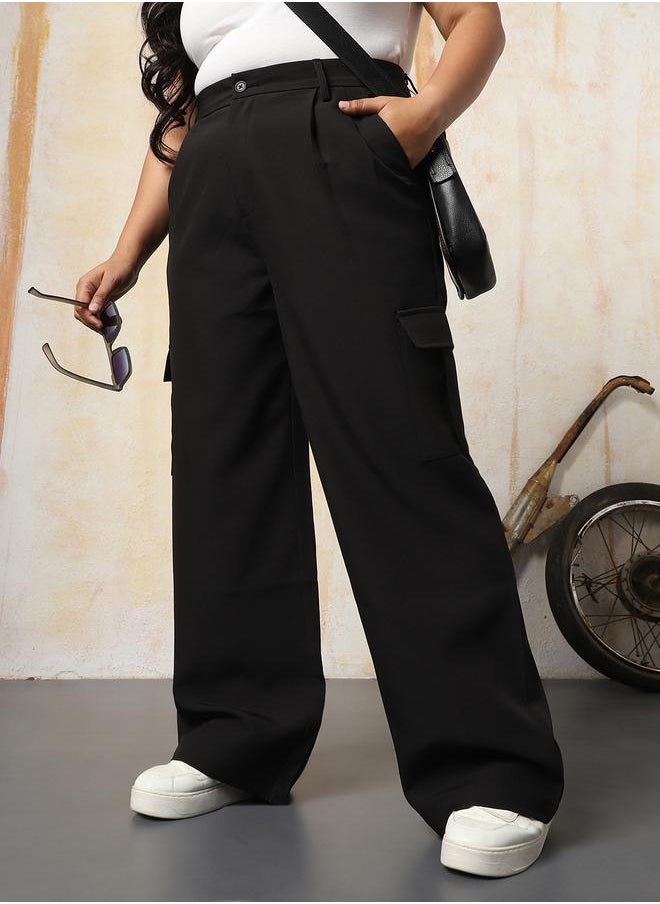 Women Trousers in Black featuring Wide Leg fit with a solid pattern, regular length, secured with button closure, crafted from 95% polyester 5% spandex – your go-to choice for effortless elegance.