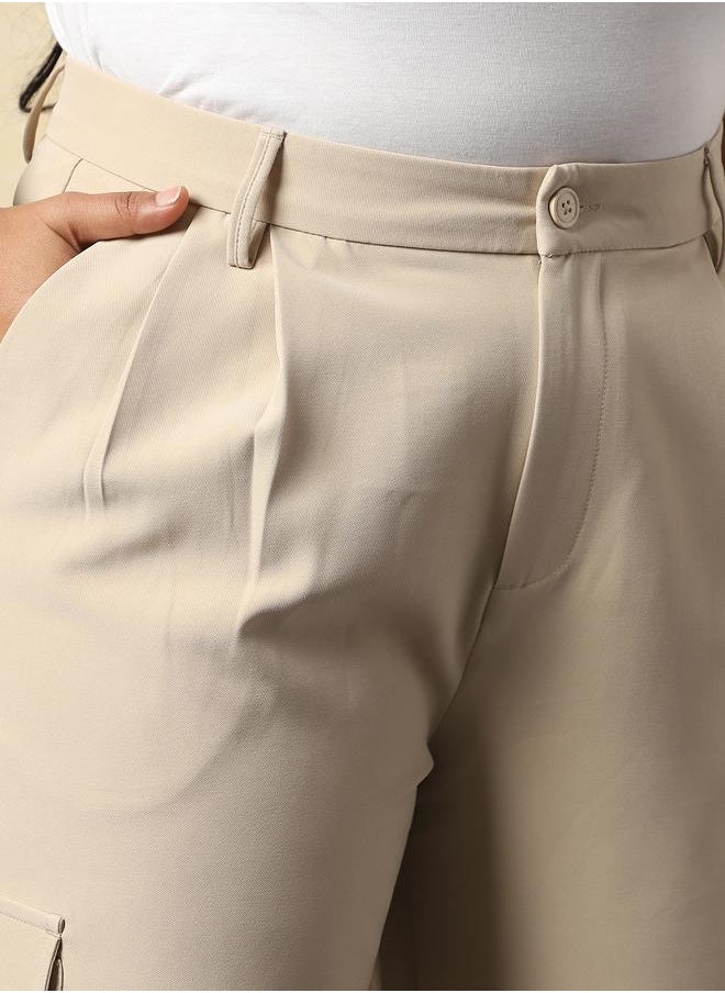 Women Trousers in Beige featuring Wide Leg fit with a solid pattern, regular length, secured with button closure, crafted from 95% polyester 5% spandex – crafted for those who appreciate style and comfort.