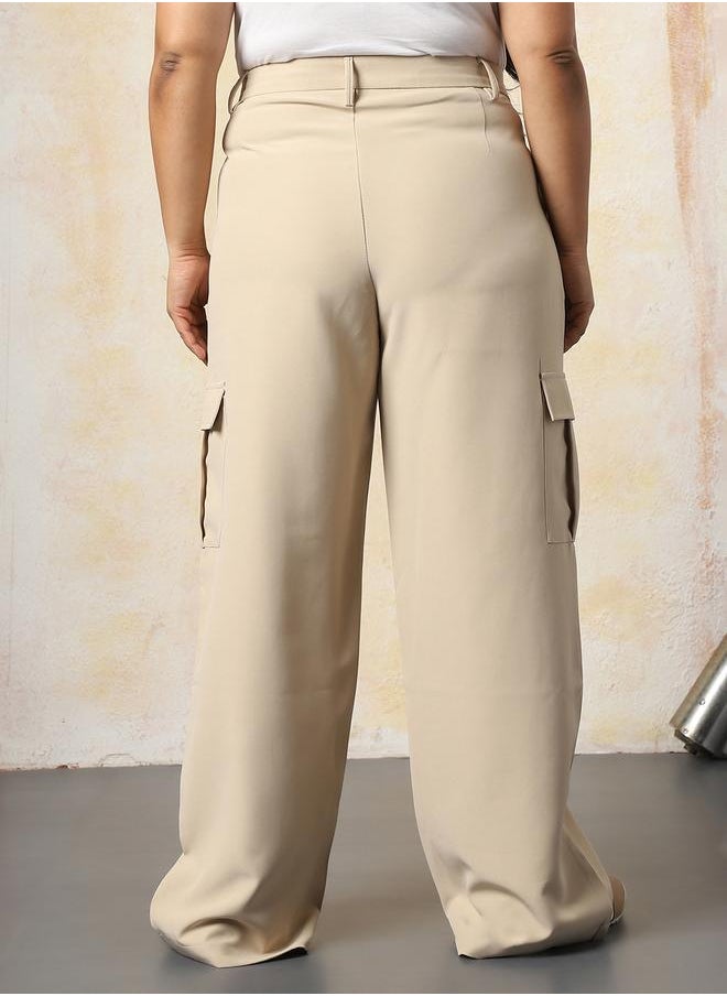 Women Trousers in Beige featuring Wide Leg fit with a solid pattern, regular length, secured with button closure, crafted from 95% polyester 5% spandex – crafted for those who appreciate style and comfort.