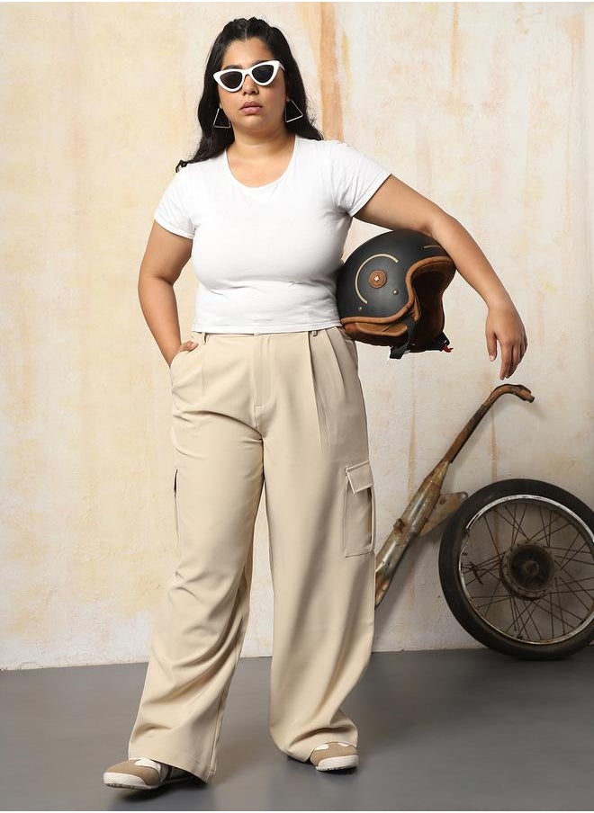 Women Trousers in Beige featuring Wide Leg fit with a solid pattern, regular length, secured with button closure, crafted from 95% polyester 5% spandex – crafted for those who appreciate style and comfort.