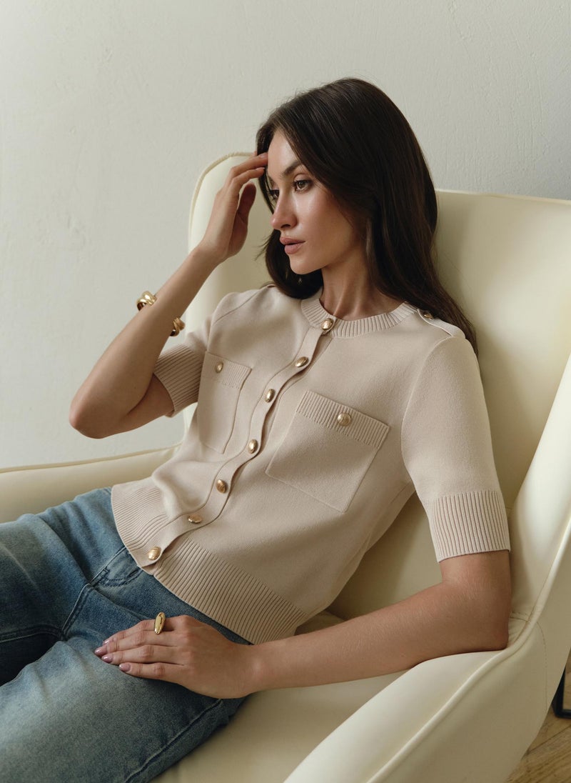 Short-sleeved knitted cardigan with golden fittings