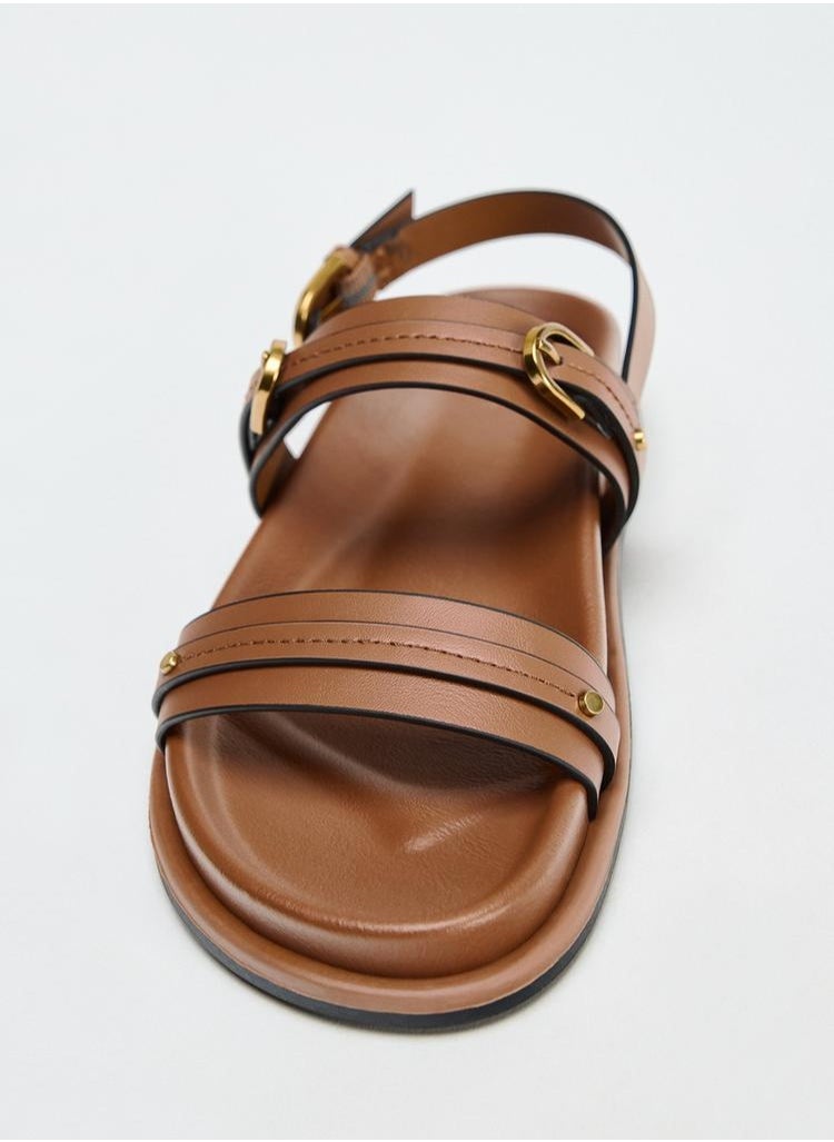 Sandals with buckles