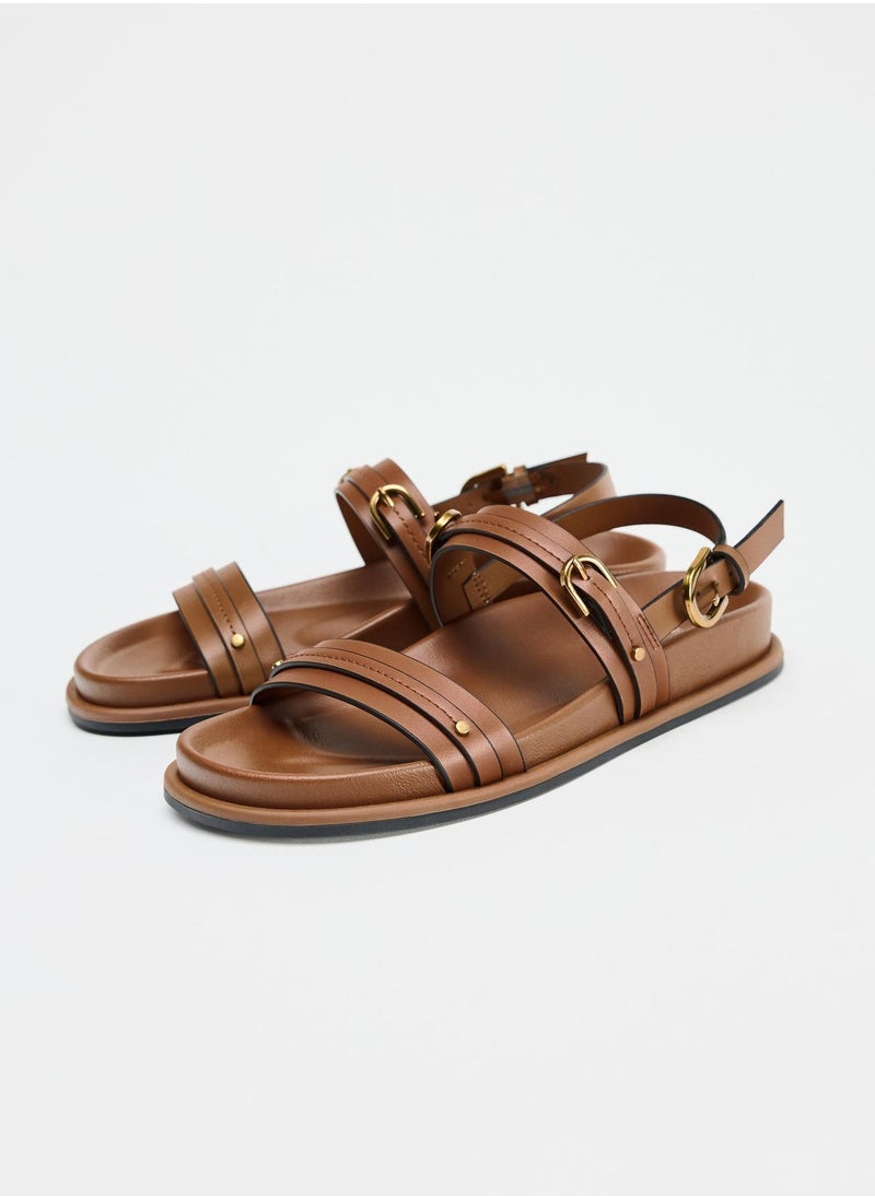 Sandals with buckles