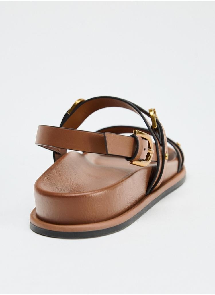 Sandals with buckles