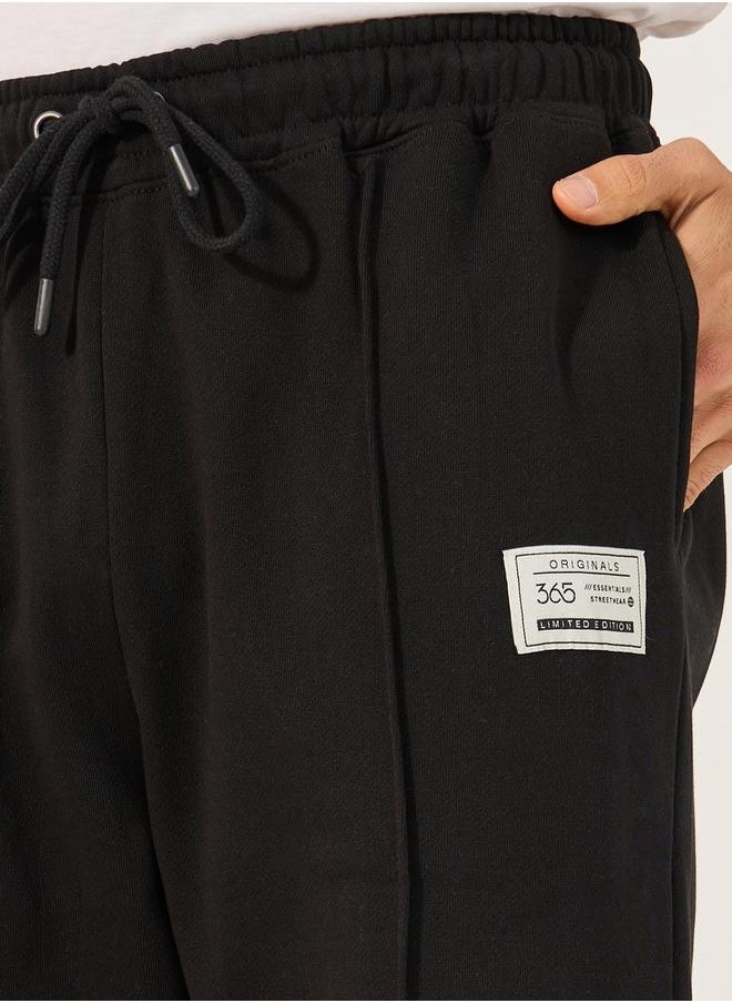 Fleece Pintuck Relaxed Open Hem Joggers with Badge Detail