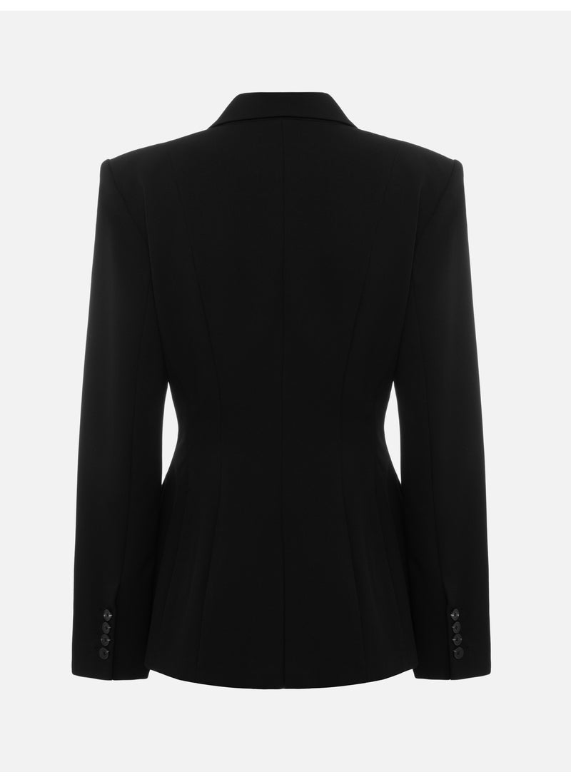 Fitted jacket with an accent brooch