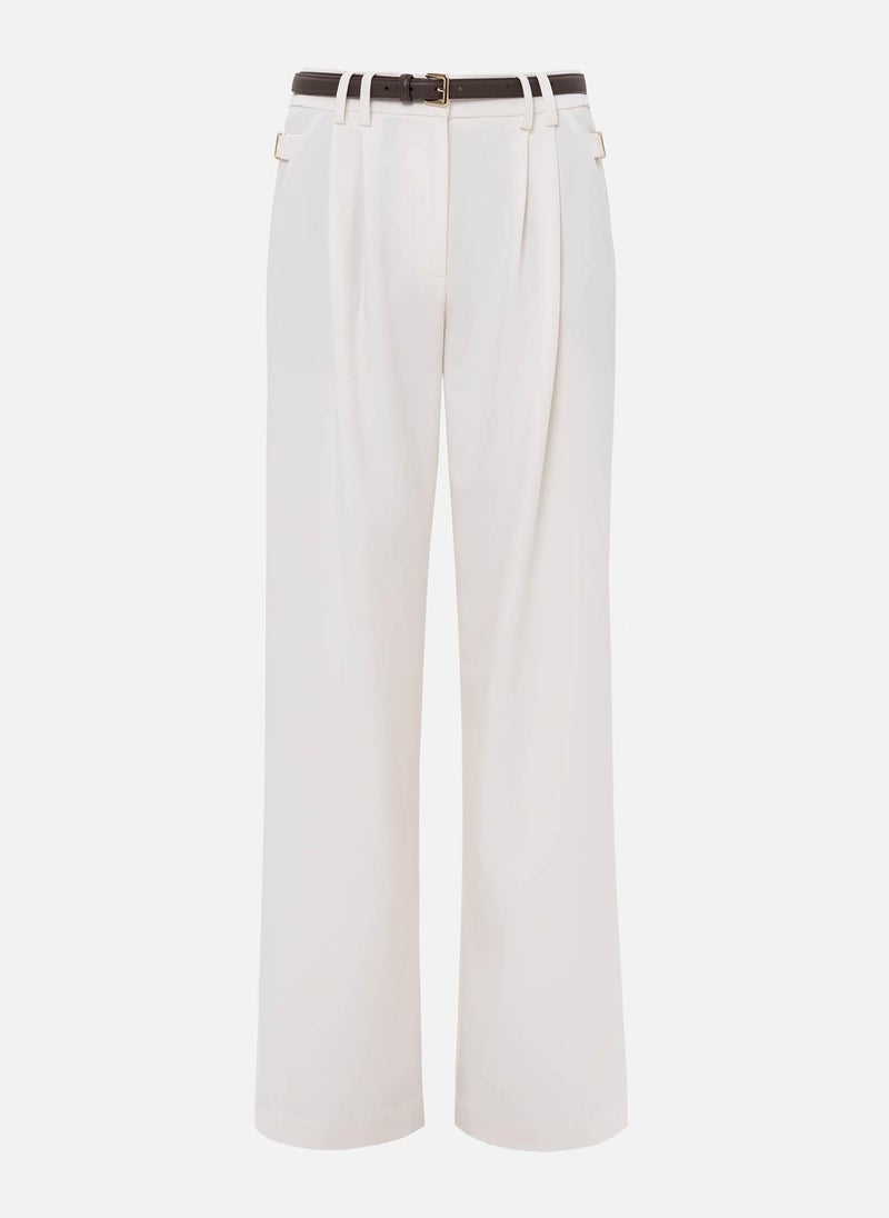 Loose suiting trousers with eco-leather belt