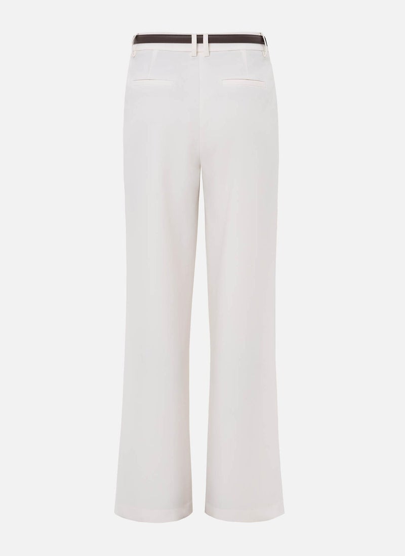 Loose suiting trousers with eco-leather belt