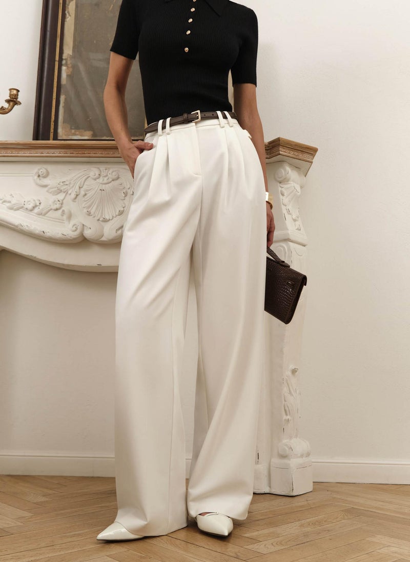 Loose suiting trousers with eco-leather belt