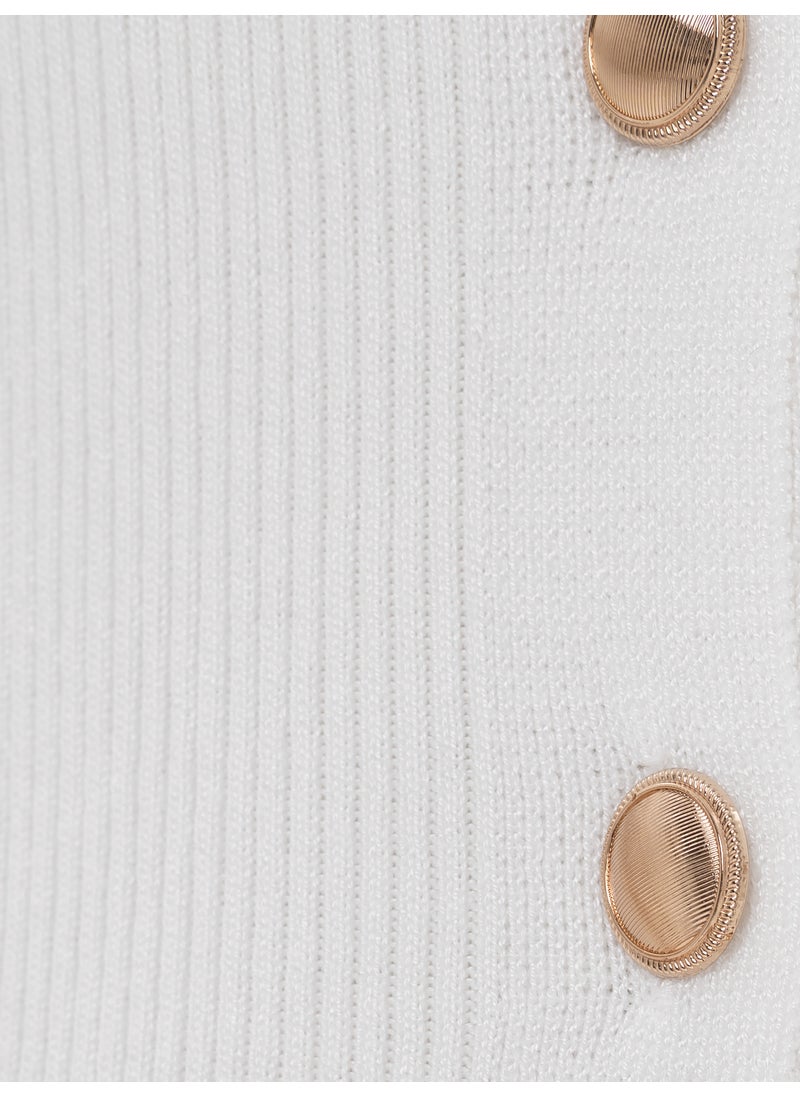Knitted midi dress with buttons at the front and matching belt