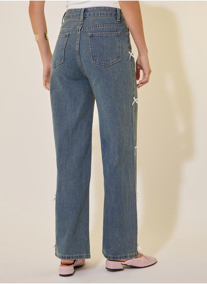 Mid Rise Wide Leg Faded Jeans with Bow Detail