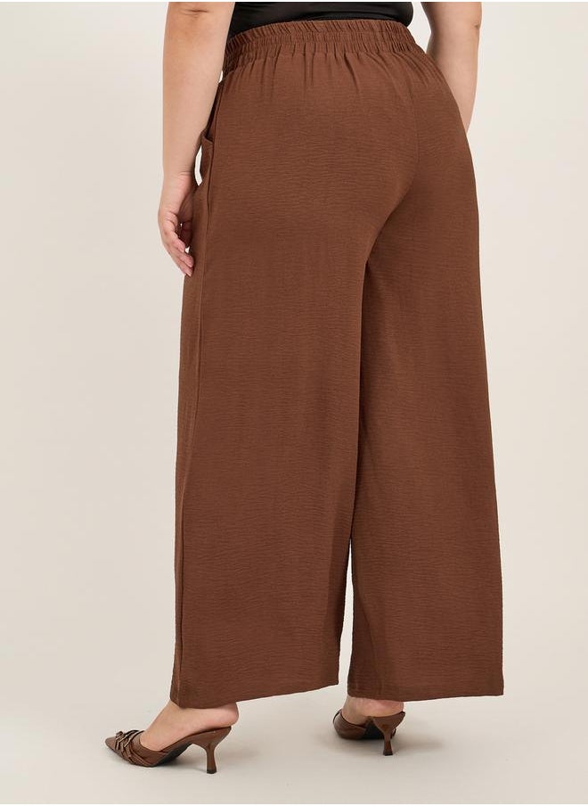 Plus Size Textured Wide Leg Trousers with Chain Buckle Detail