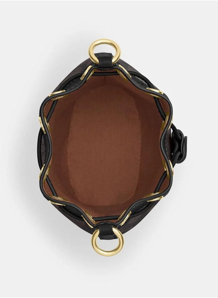 حقيبة دلو صغيرة من قماش Coach Signature