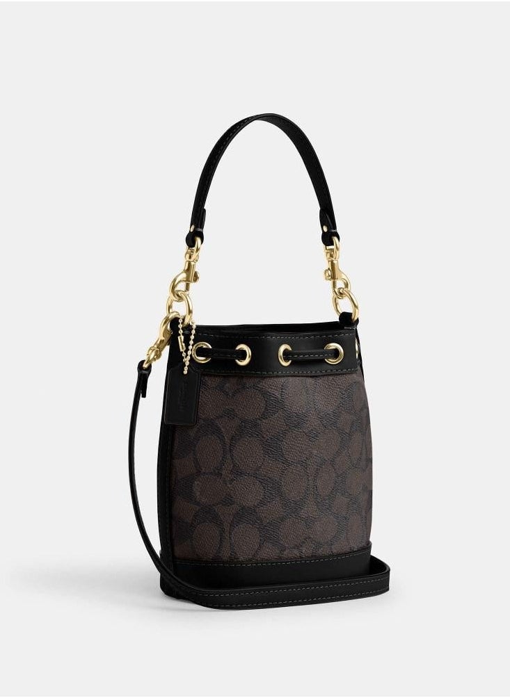حقيبة دلو صغيرة من قماش Coach Signature