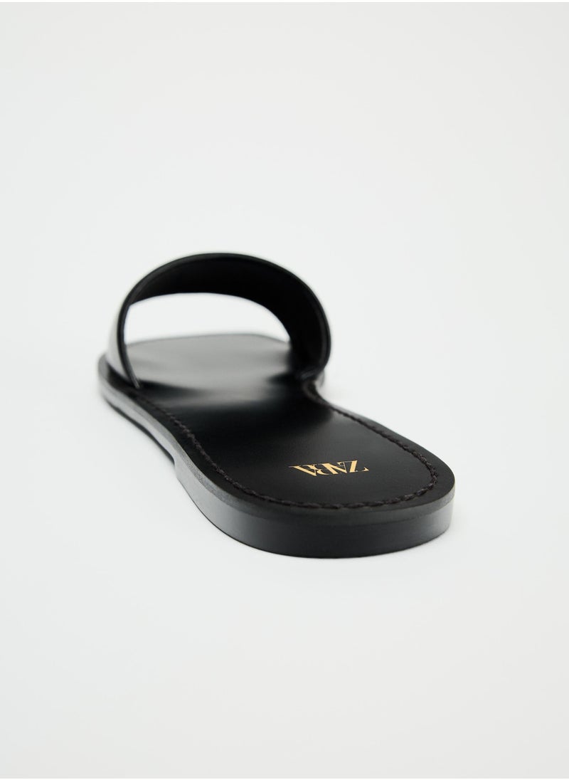 Flat leather sandals