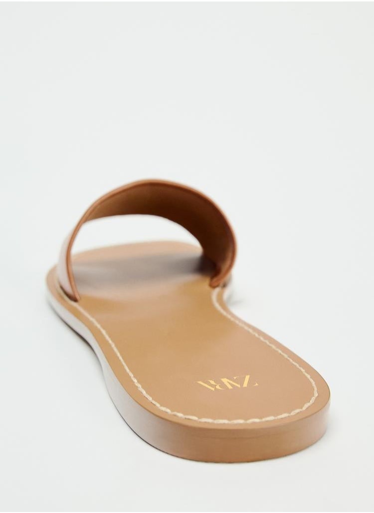 Flat leather slider sandals
