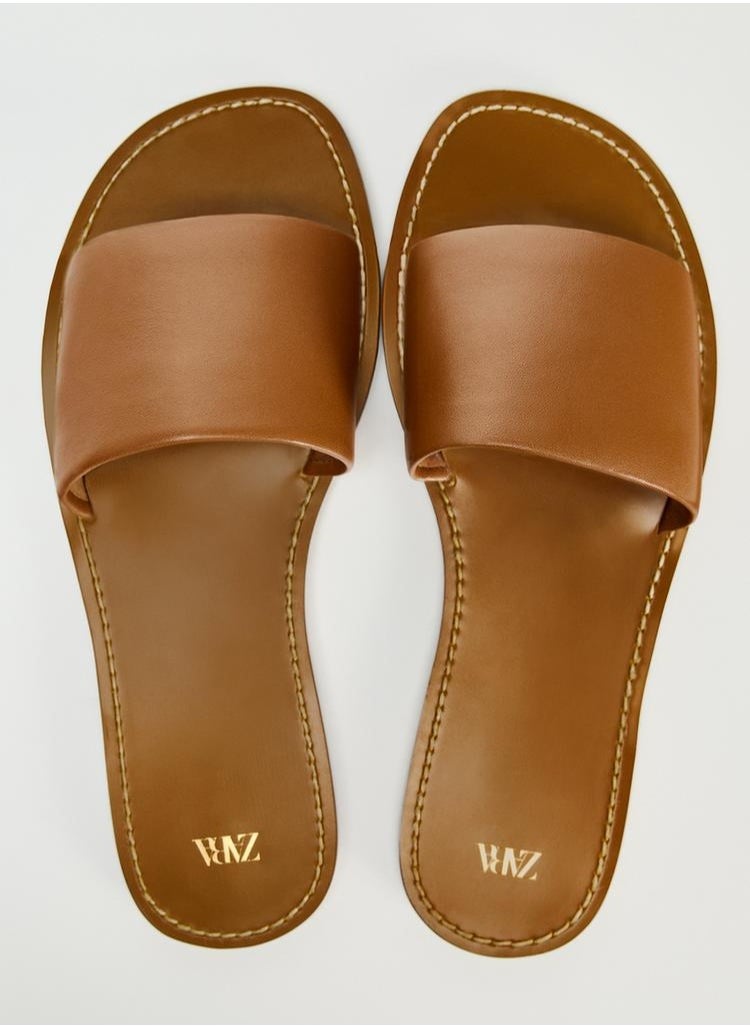 Flat leather slider sandals