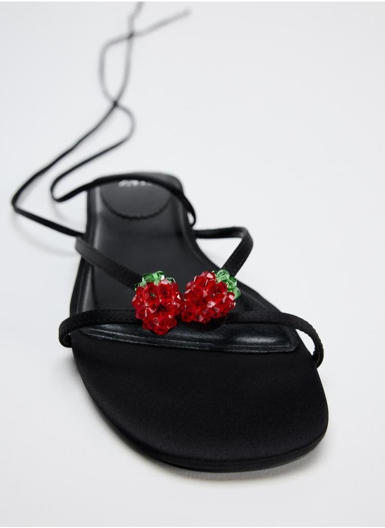 Lace-up flat sandals