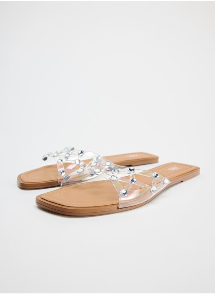 Flat vinyl sandals with rhinestones