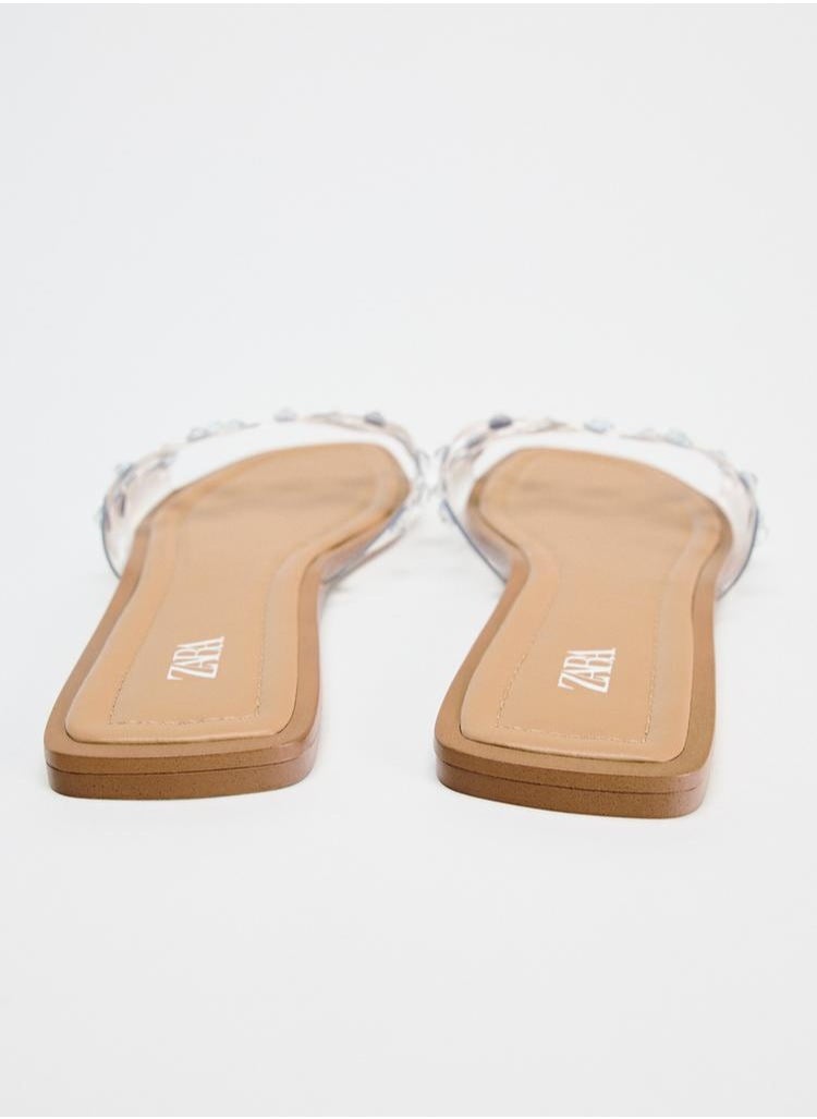 Flat vinyl sandals with rhinestones