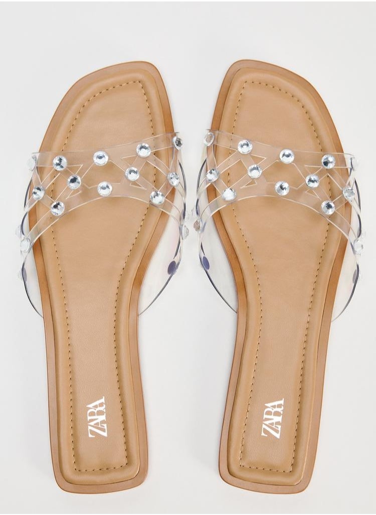 Flat vinyl sandals with rhinestones