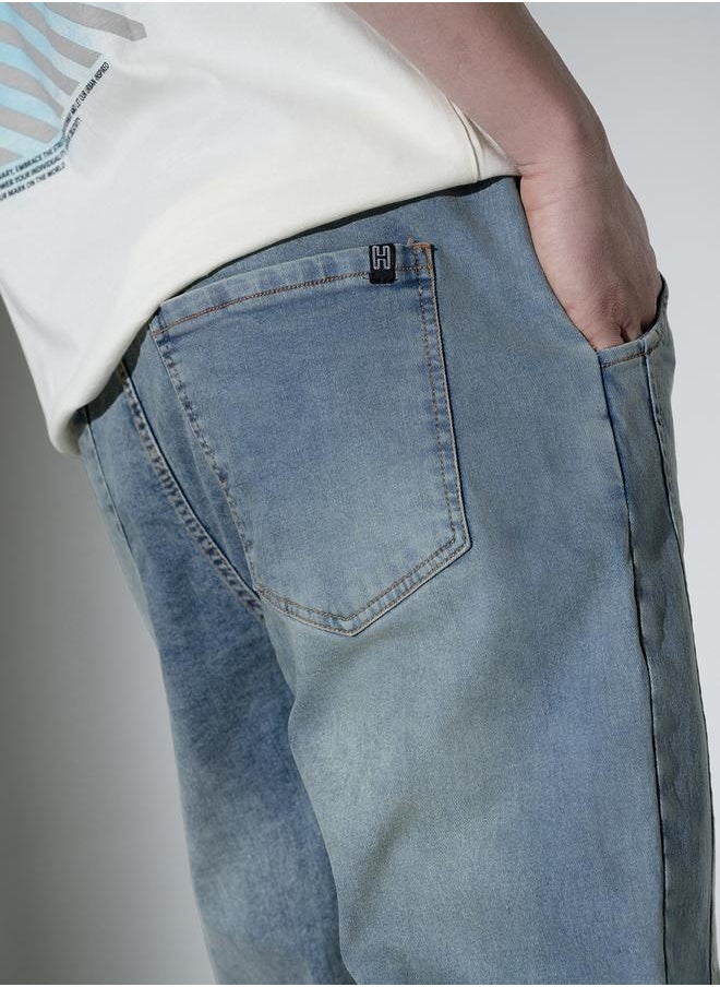 Blue Relaxed Fit Jeans Solid design crafted from 100% Cotton with Button closure.