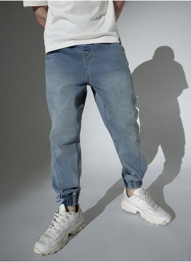 Blue Relaxed Fit Jeans Solid design crafted from 100% Cotton with Button closure.