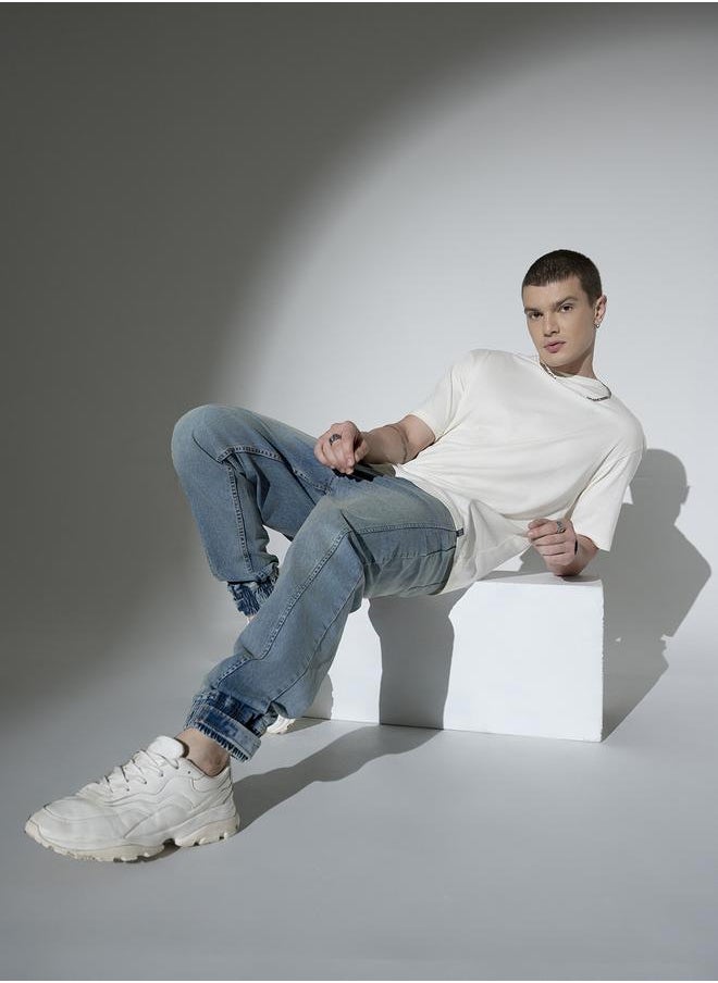 Blue Relaxed Fit Jeans Solid design crafted from 100% Cotton with Button closure.