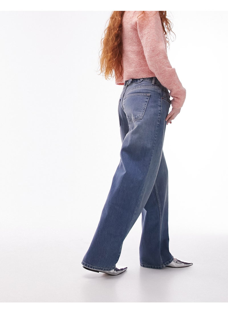 Topshop high rise Cinch back jeans in mid blue