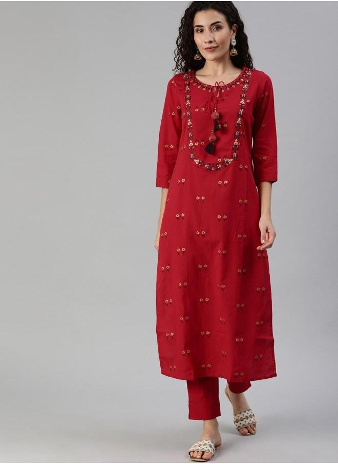 Elastic Women Red Rayon Kurtis with Embroidered pattern Tunic and features a Round neckline and Three-Fourth Sleeve secured with Elastic closure and styled in Straight Fit ideal for Festive moments — crafted to elevate your special moments.