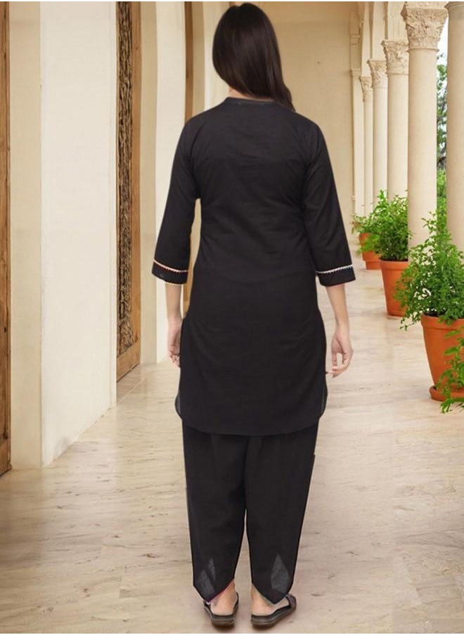 Elastic Women Black Cotton Kurta Set with Embroidered pattern Tunic and Palazzo features a Round neckline and Three-Fourth Sleeve secured with Elastic closure and styled in Straight Fit ideal for Festive moments — a must-have for your statement wardrobe.
