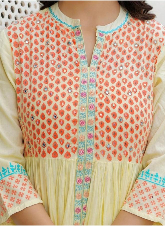 Elegant Women Yellow Cotton Dress with Embroidered pattern and features a Round neckline and Three-Fourth Sleeve secured with closure and styled in Straight Fit ideal for Festive moments — perfect for fashion-forward occasions.