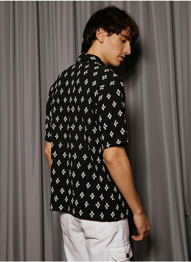 Campus Sutra Men's Midnight Black Floral-Tactile Oversized Shirt For Casual Wear | Spread Collar | Short Sleeve | Button Closure | Oversized Shirt Crafted With Comfort Fit For Everyday Wear