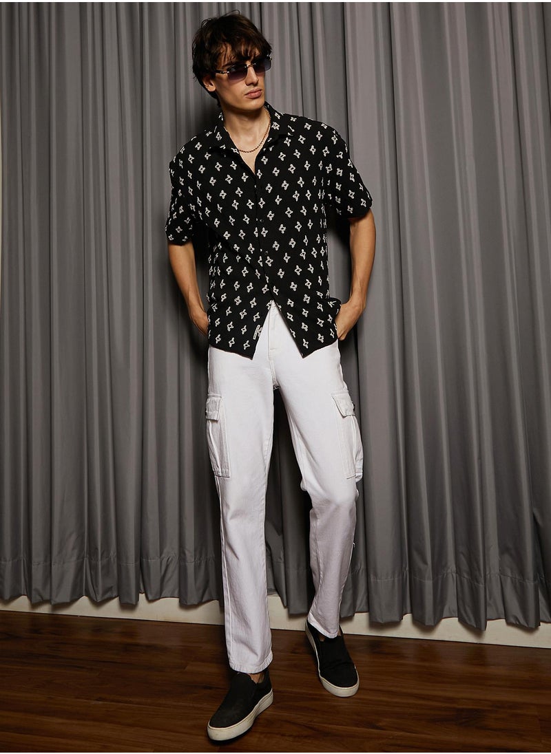 Campus Sutra Men's Midnight Black Floral-Tactile Oversized Shirt For Casual Wear | Spread Collar | Short Sleeve | Button Closure | Oversized Shirt Crafted With Comfort Fit For Everyday Wear