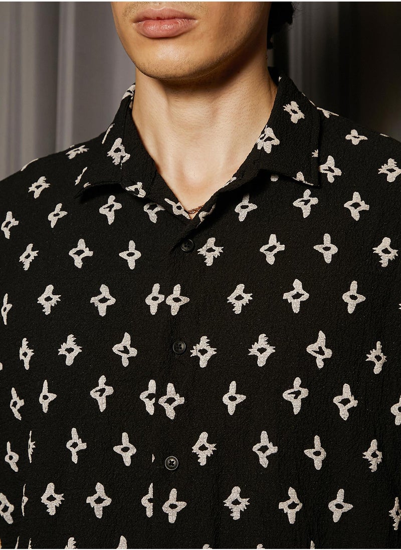 Campus Sutra Men's Midnight Black Floral-Tactile Oversized Shirt For Casual Wear | Spread Collar | Short Sleeve | Button Closure | Oversized Shirt Crafted With Comfort Fit For Everyday Wear