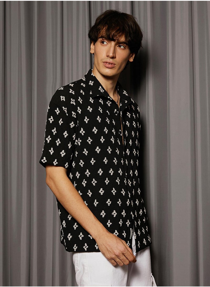 Campus Sutra Men's Midnight Black Floral-Tactile Oversized Shirt For Casual Wear | Spread Collar | Short Sleeve | Button Closure | Oversized Shirt Crafted With Comfort Fit For Everyday Wear