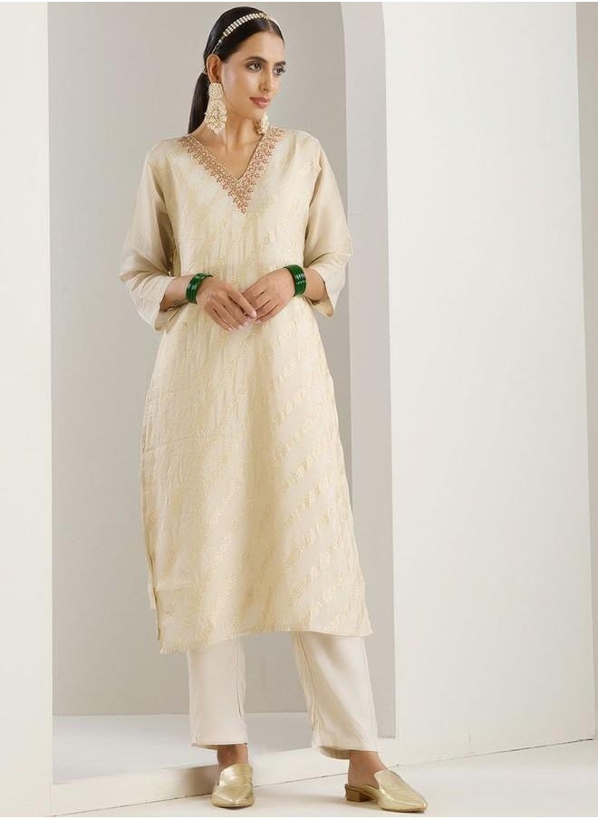 Palazzo Women White Poly silk Kurta Set with Embroidered pattern Tunic and Palazzo features a Round neckline and Three-Fourth Sleeve secured with Elastic closure and styled in Straight Fit ideal for Festive moments — a must-have for your statement wardrobe.