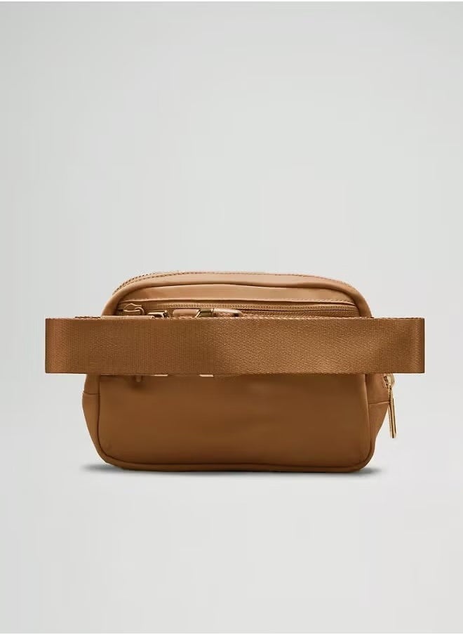 Everywhere Belt Bag, Compact and Convenient Belly Bag with Zippered Pockets, Easy Access Exterior Pocket and Interior Essentials Pocket for On the Go Storage, Brown