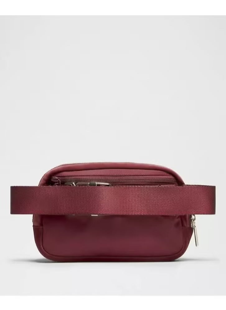 Everywhere Belt Bag, Compact Crossbody Bag with Zippered Pockets, Exterior Pocket, and Interior Essentials Storage for On-the-Go Convenience, Maroon