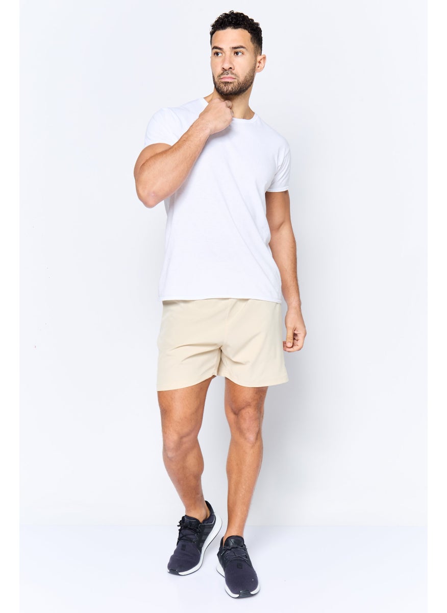 Men Sportswear Fit 5 Inseam Training Short, Beige